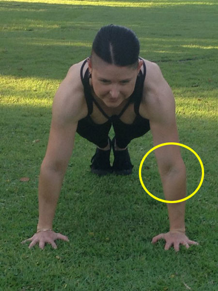 Point the elbow pits forward at the top of your push ups