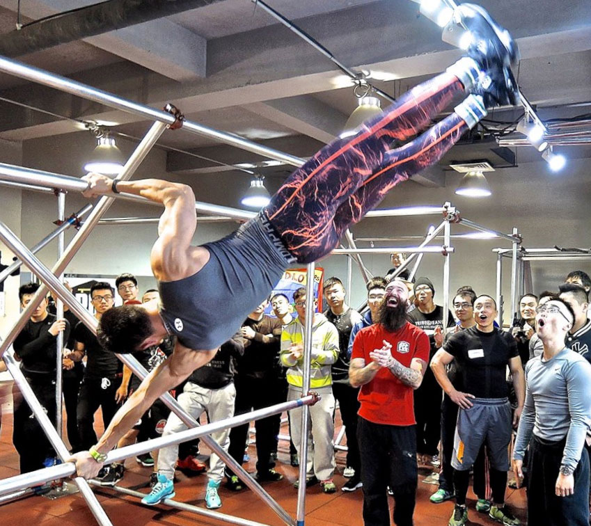 PCC Participant performs a Human Flag at the PCC Workshop in China